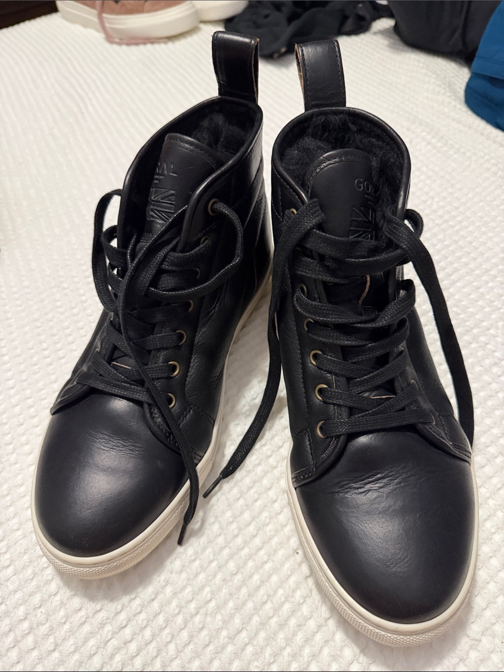 GORAL Black Leather High-Top Sneakers with White Soles and Gold Eyelets